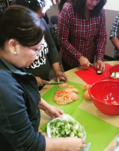 Women cooking in our Salud con Sabor Latino program in Phoenix, Arizona