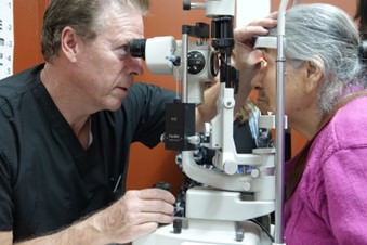 Doctor giving a patient an eye exam