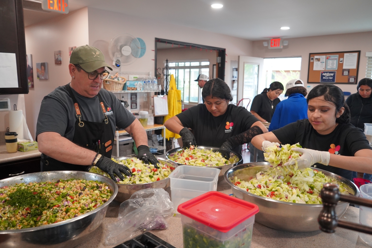 Advance Community volunteers packing nutrition boxes
